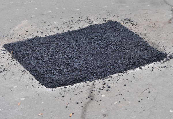 Deteriorated Driveway Patching
